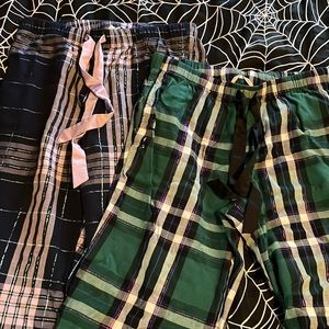 Two pair long Victoria’s Secret pajama pants.